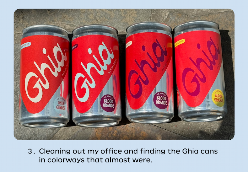 an image of a group of cans of soda sitting on a sidewalk