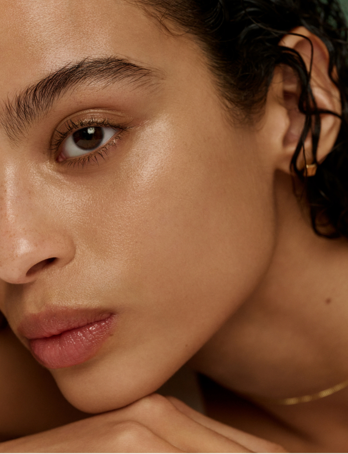 An image of a model showing the finish of Tatcha's skincare