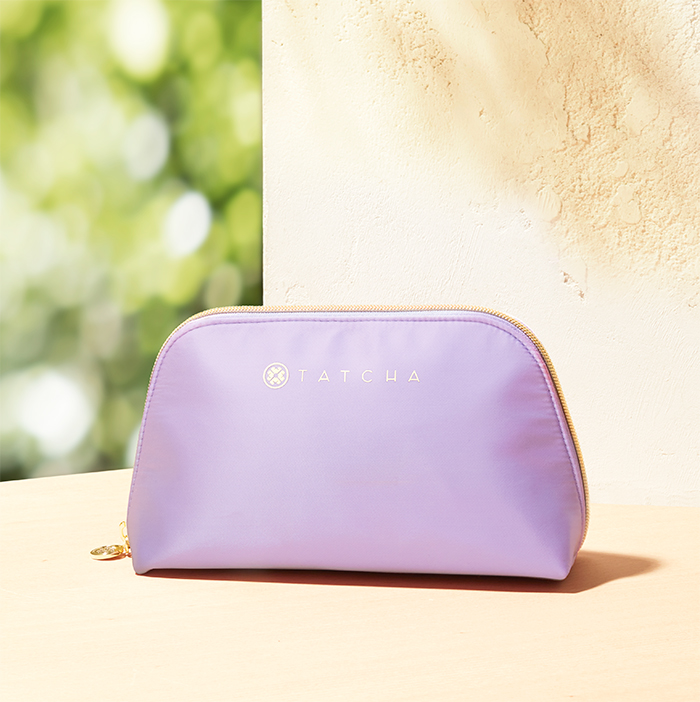 An image of a branded Tatcha makeup bag
