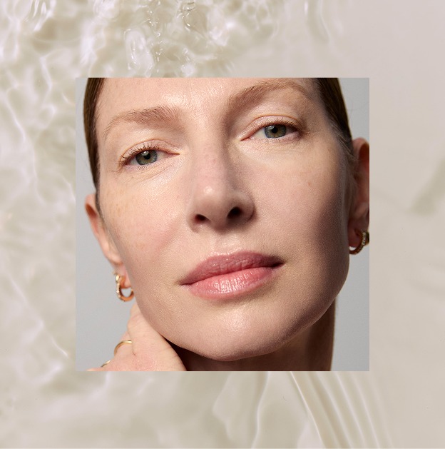 A model showing visibly firm and smooth skin from using Tatcha's healthy-aging skincare products