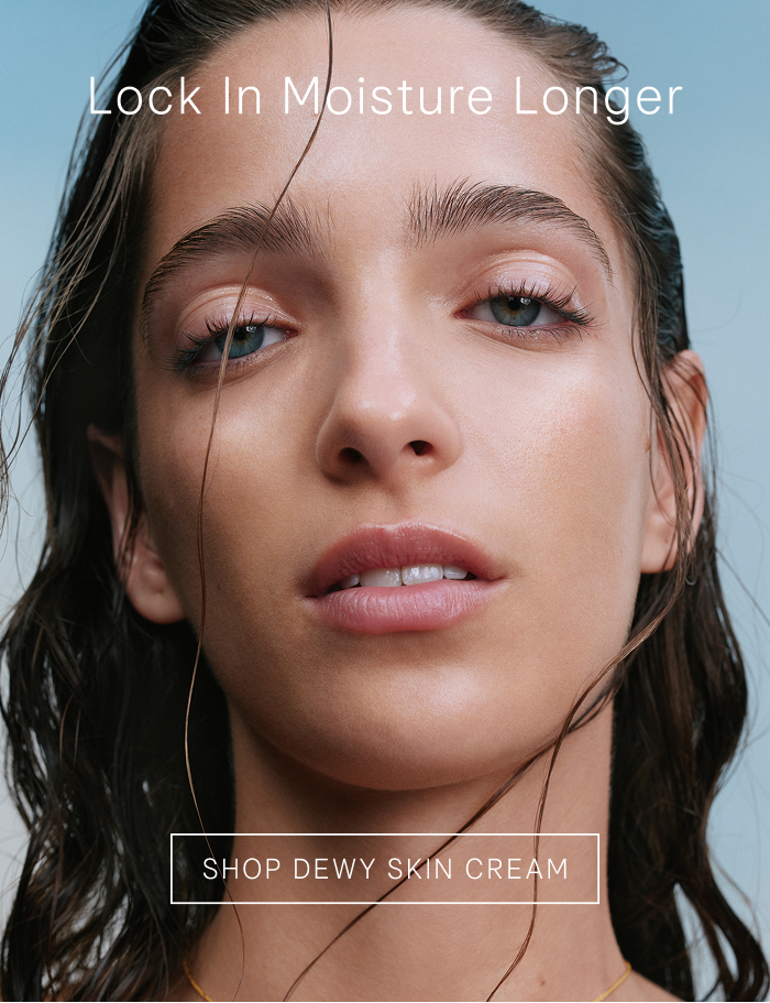 An image of a model's face after using the Dewy Skin Cream from Tatcha.