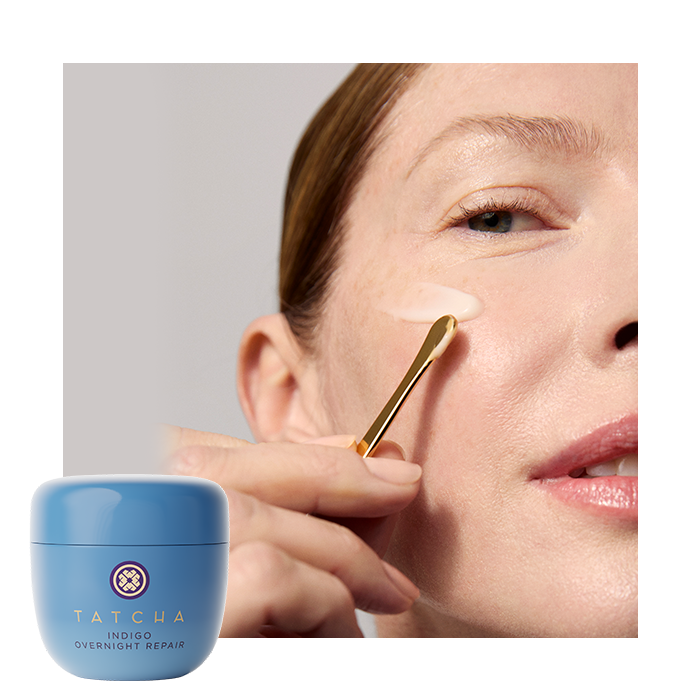 An image showing Indigo Overnight Repair moisturizer applied on a model