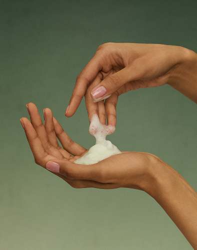 An image of The Matcha Foam Cleanse formula in hands