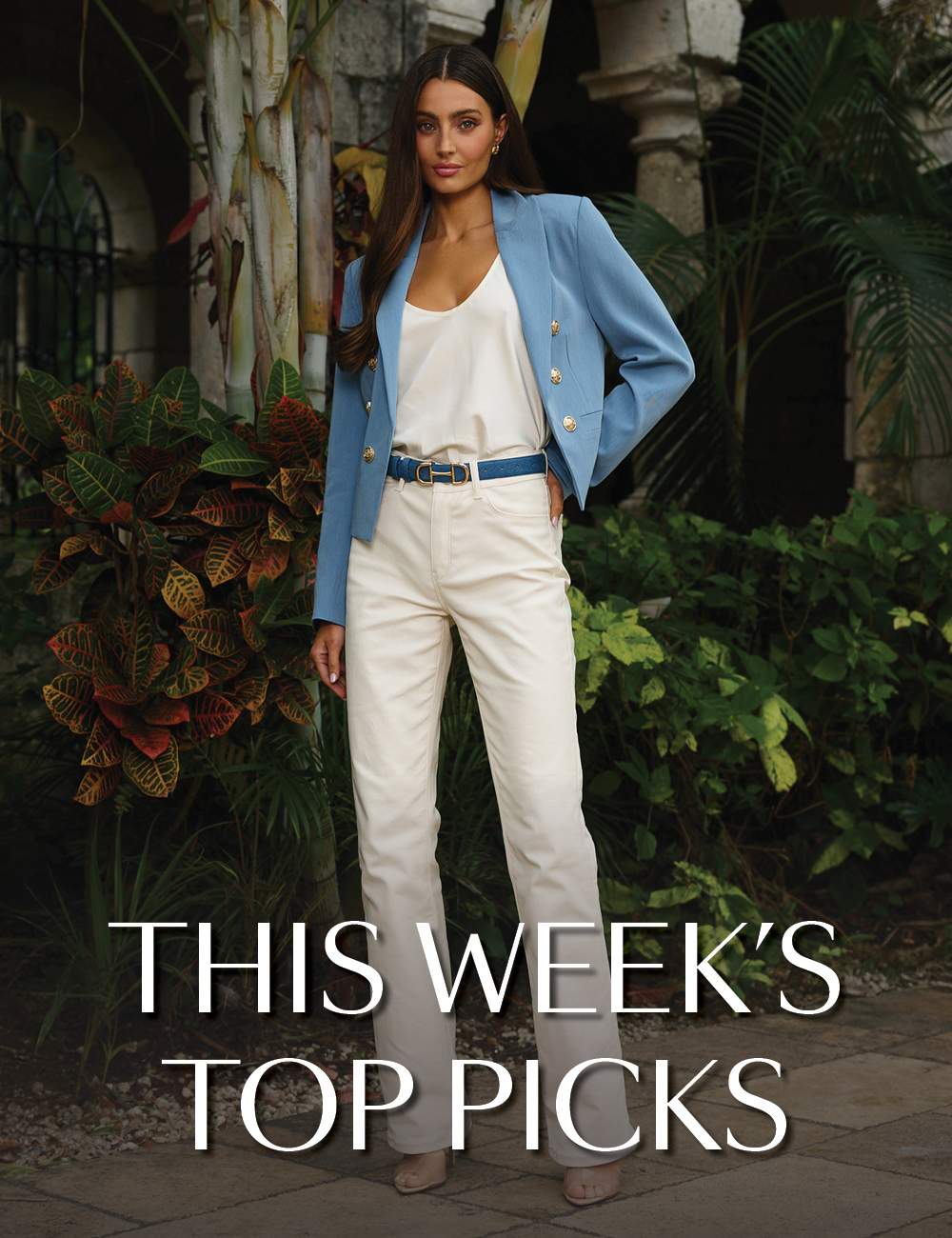 This Week's Top Picks. An image of a model standing posed wearing a full look from the new Noli Spring collection with a lush garden behind her.
