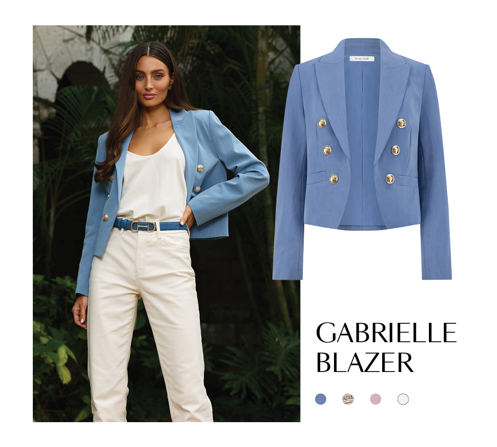 Gabrielle Blazer. A flat image of the blazer in Serene Blue and below shows 4 available color swatches for it. On the left is an image of a model wearing the Blazer with a lush garden behind her.
