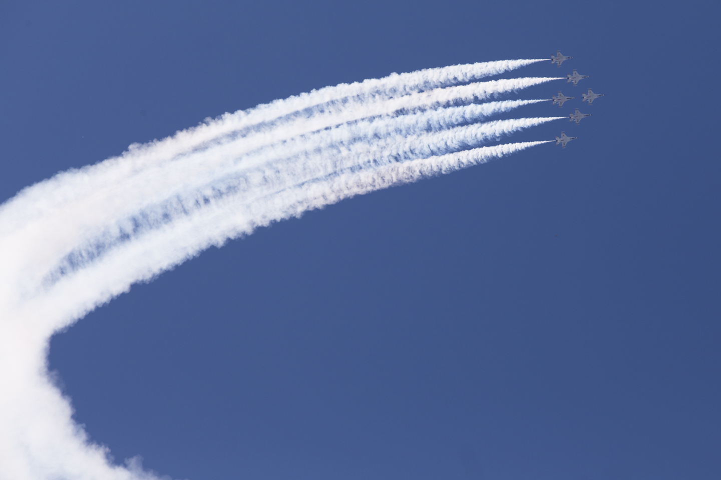 Clear Sky with Aerobatic Smoke Show