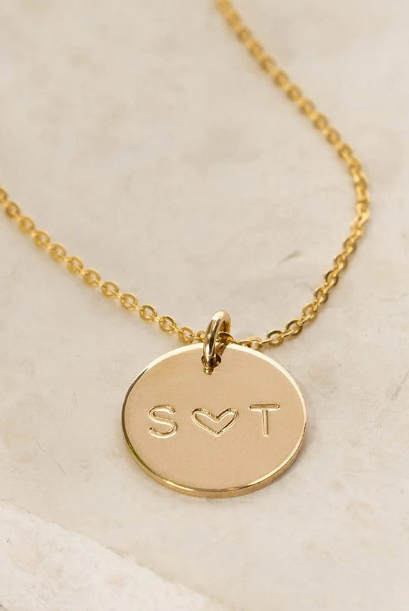 Love disc hand stamped necklace from Made by Mary