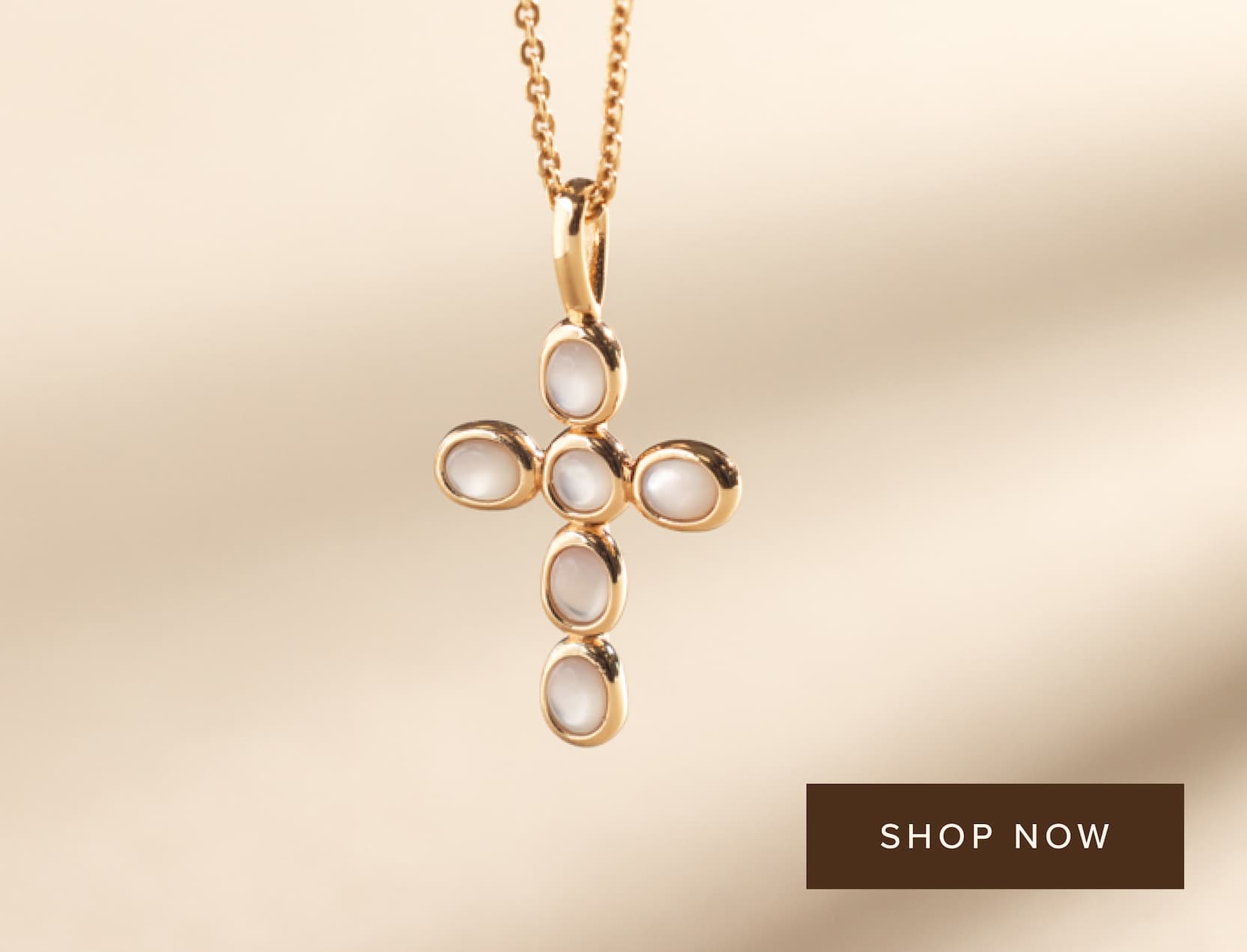 Mother of pearl cross charm. Shop now.