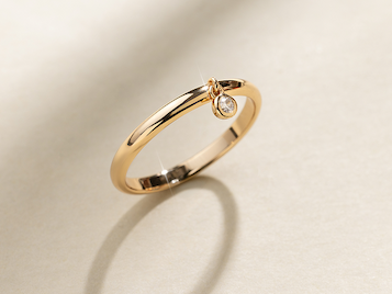 CZ poppy drop ring
