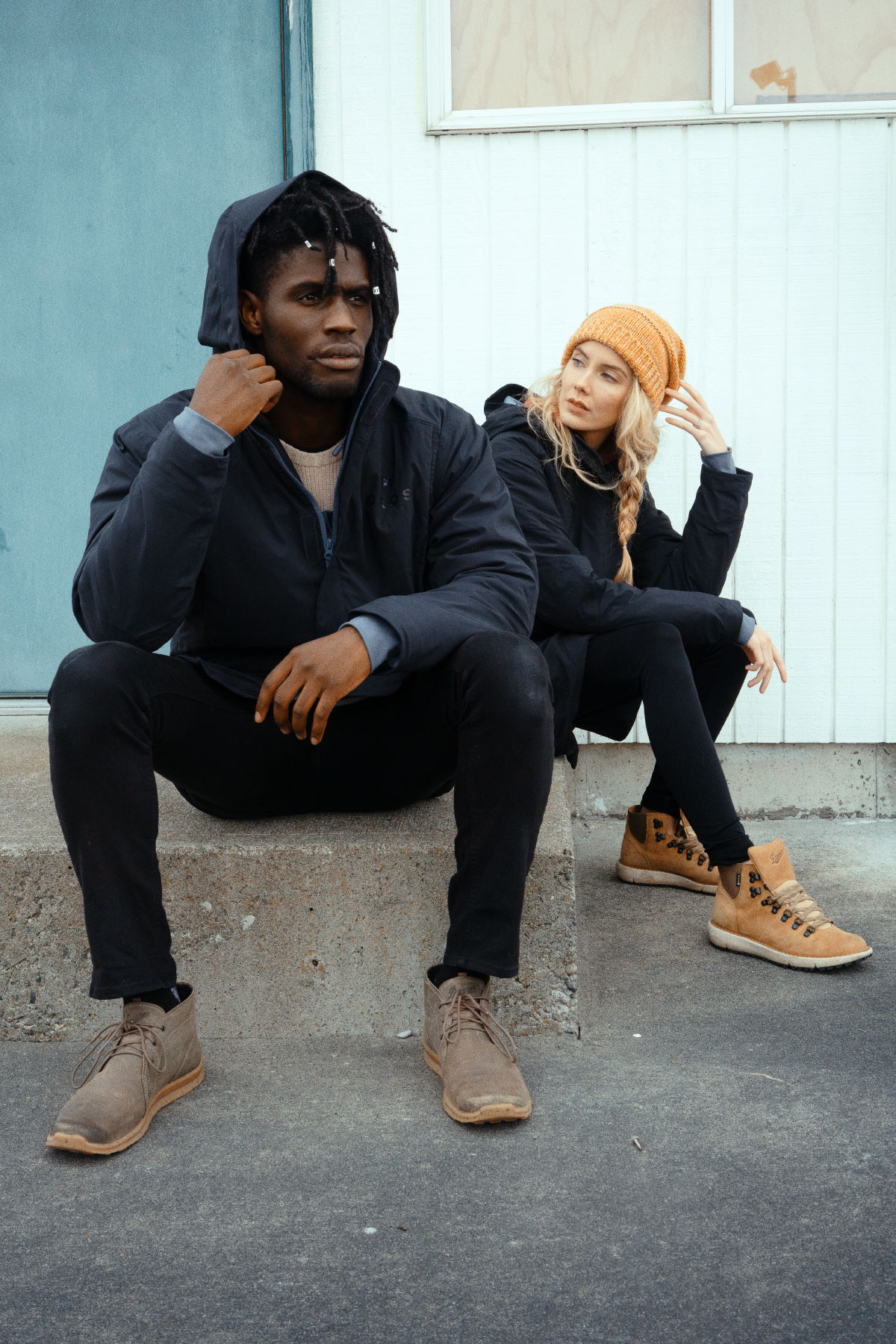 Man and woman wearing Orion Parka on glacier
