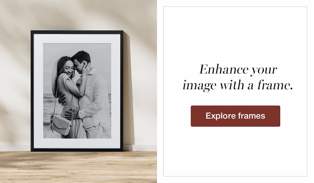an image of a couple kissing in a black and white photo frame