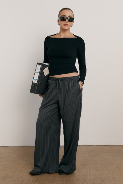 boat neck and pinstripe trousers