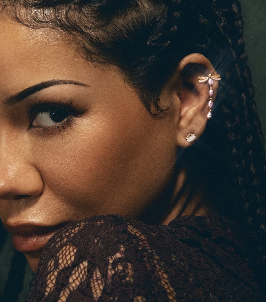 Jhene wearing collection earrings