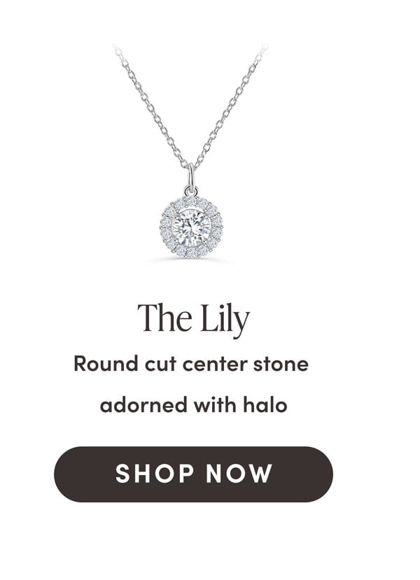 The Lily - Round cut center stone adorned with halo. Shop Now.