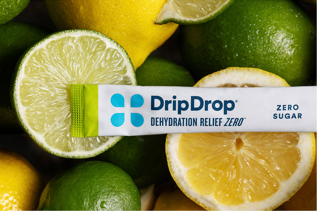 DripDrop Zero over a background of lemons and limes DripD DEHYDRATION RELIEF ZZ40 