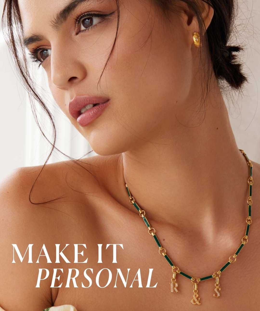 an image of a woman wearing a necklace and earrings