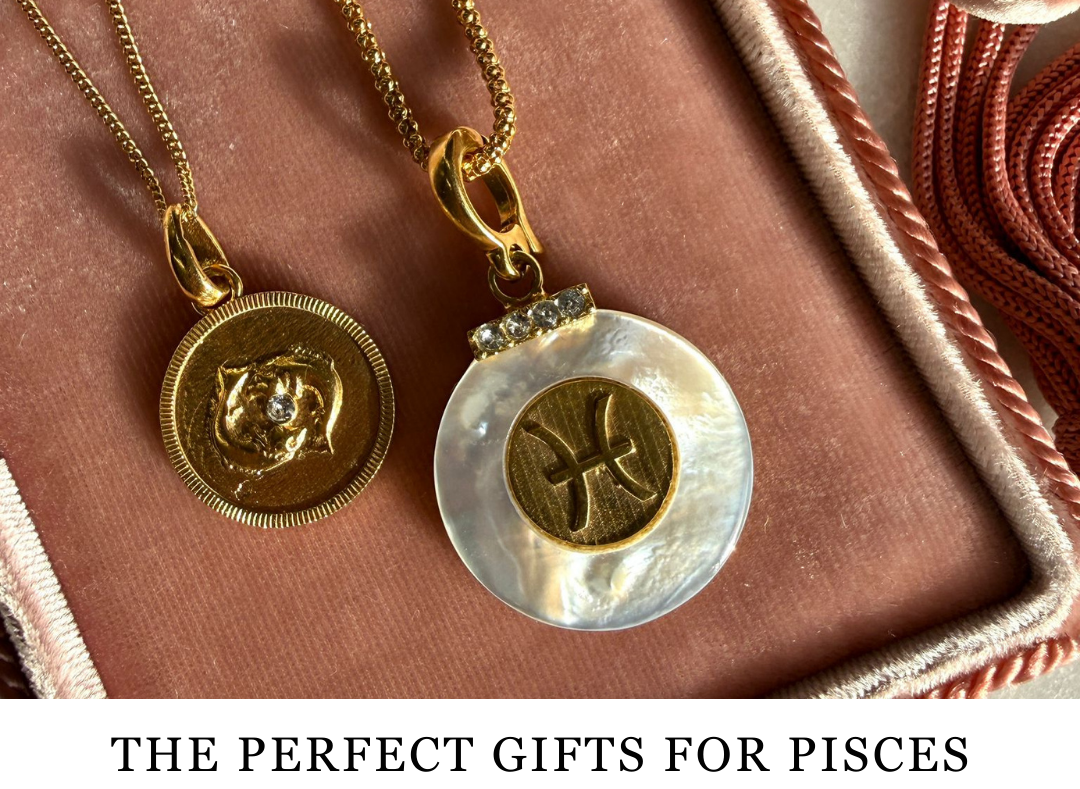 an image of two Pisces zodiac jewellery - one pendant and one charm.