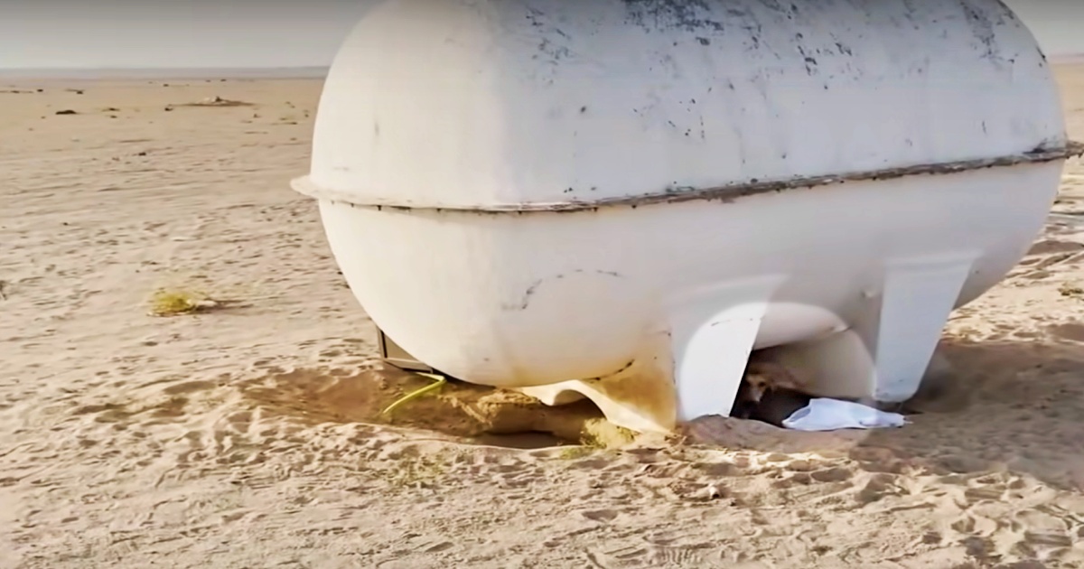 Object Stirred Beneath A Water Tank In 122-Degree Desert