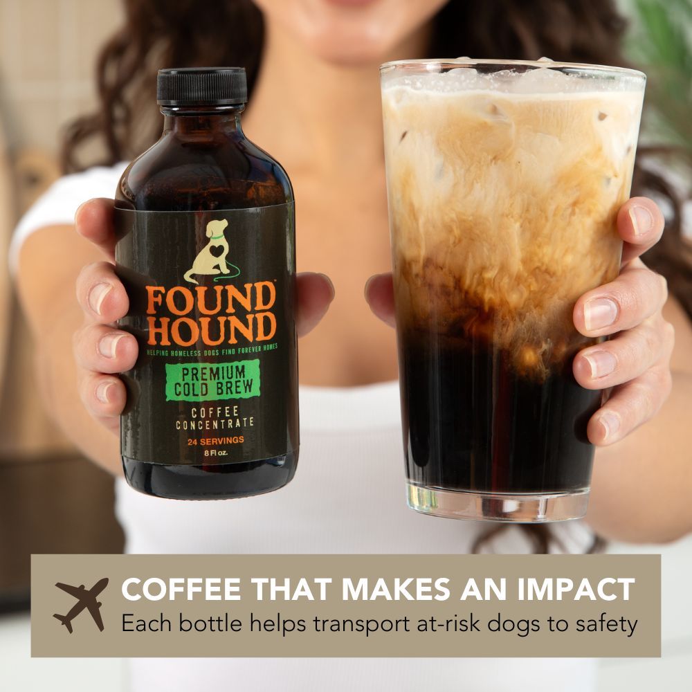 Concentrated Coffee Next to a cold brew coffee with milk. Each bottle helps transport at-risk dogs.