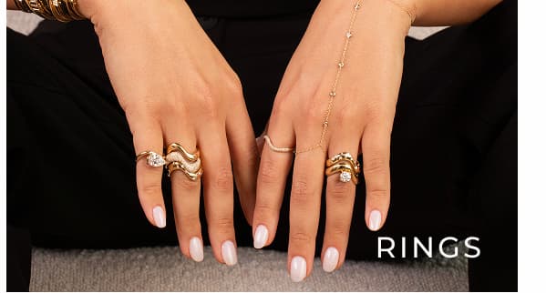 SHOP RINGS  →