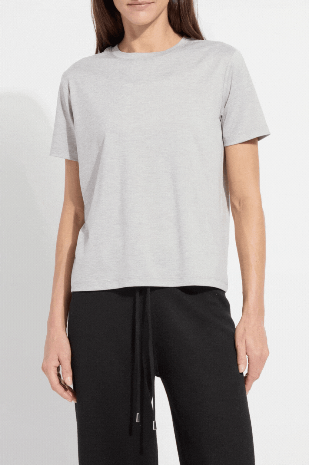 Perfect Box-Cut Tee in motion showcasing its relaxed fit and breathable, 4-way stretch COOL-FRESH™ ECO fabric.