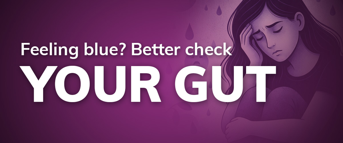 Purple image with woman holding head with text overlay "Feeling blue? Better check your gut"