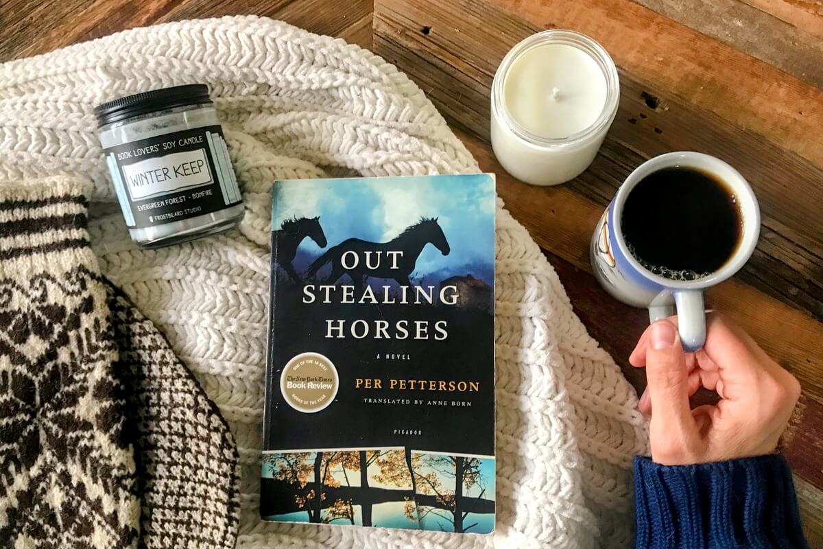 Cozy reading with blankets and a warm drink