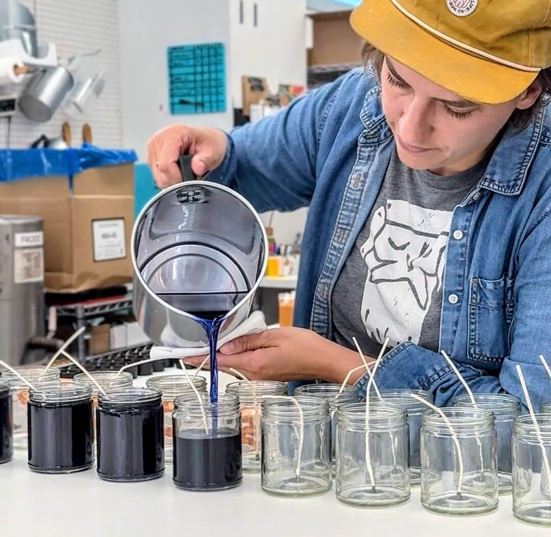 Roxie pouring candles