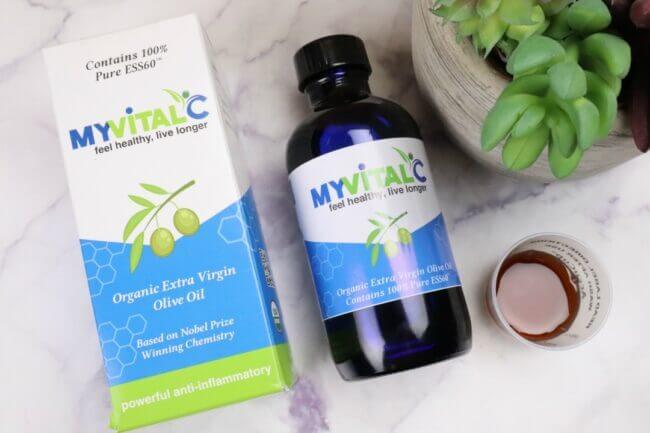 MVC Olive Oil laying on table