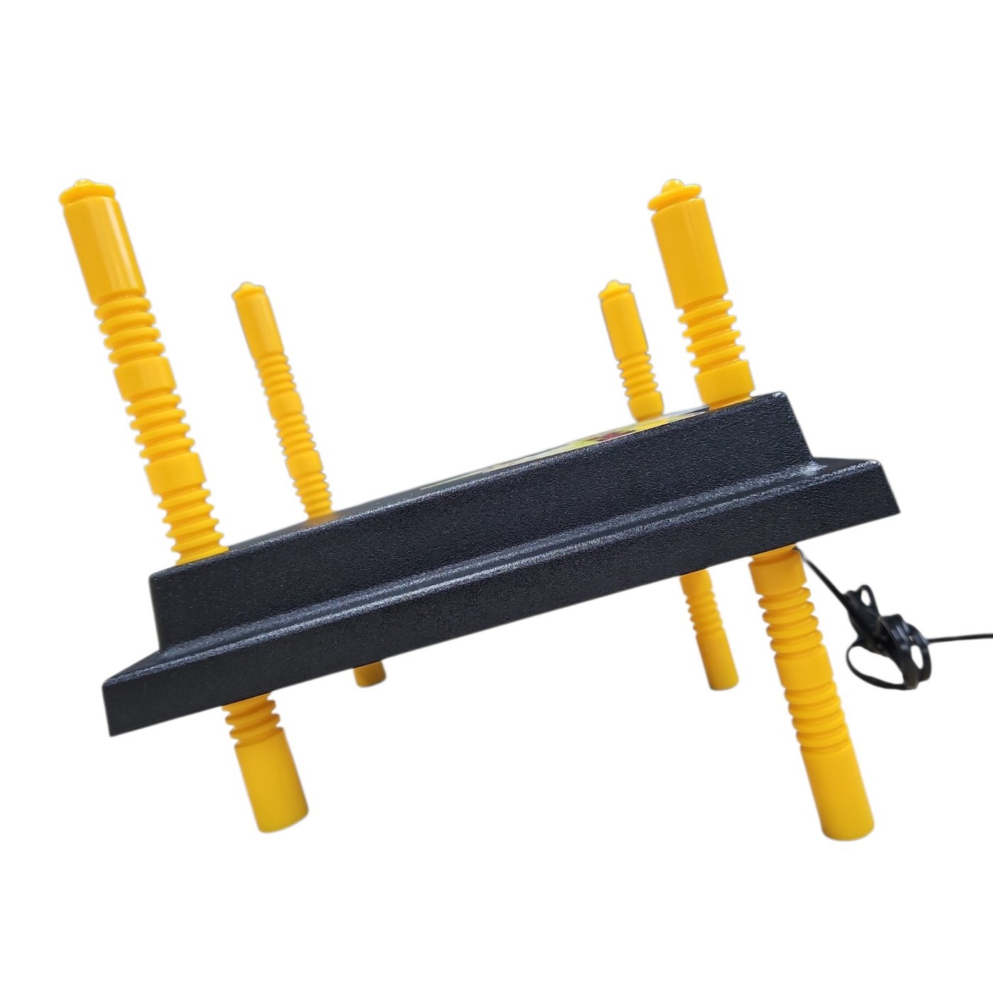 The plate set on a slope, two legs a notch lower than the other two