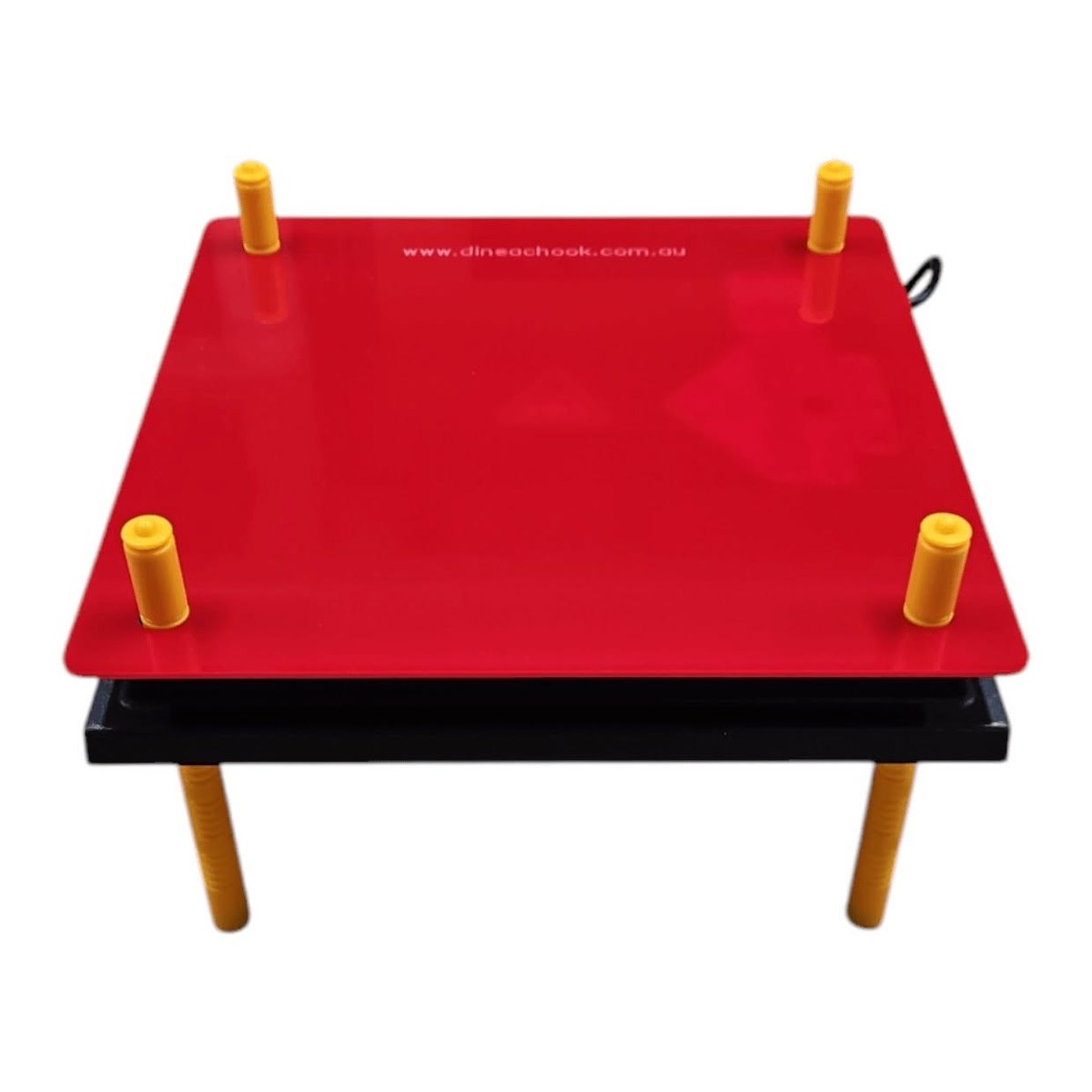 The red acrylic cover fitted on top of the heat plate