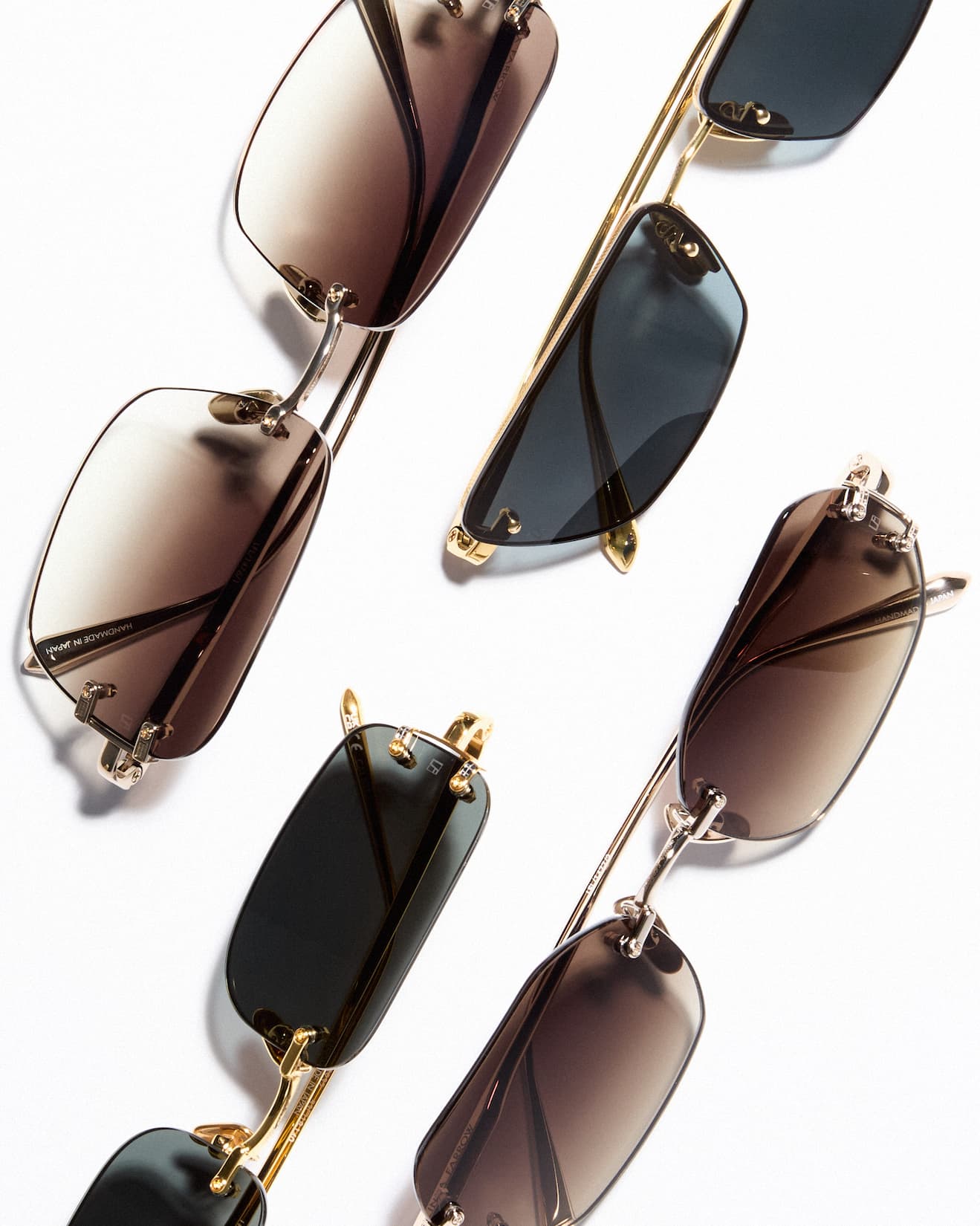 rimless sunglasses in a flat lay