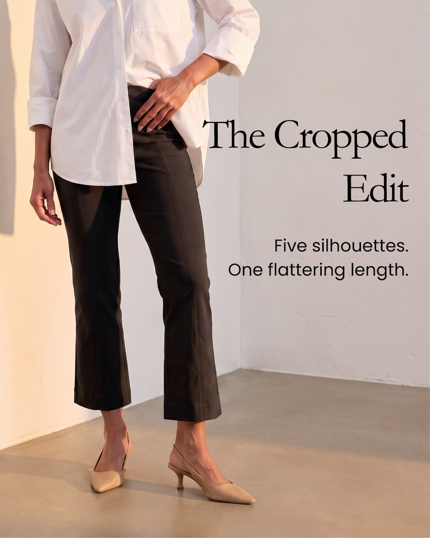 Woman in white shirt and black pants