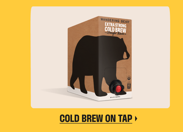 an image of a bear is standing in a box with a beer