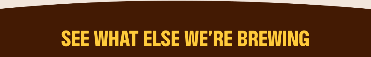 an image of a brown and white sign with a sky background