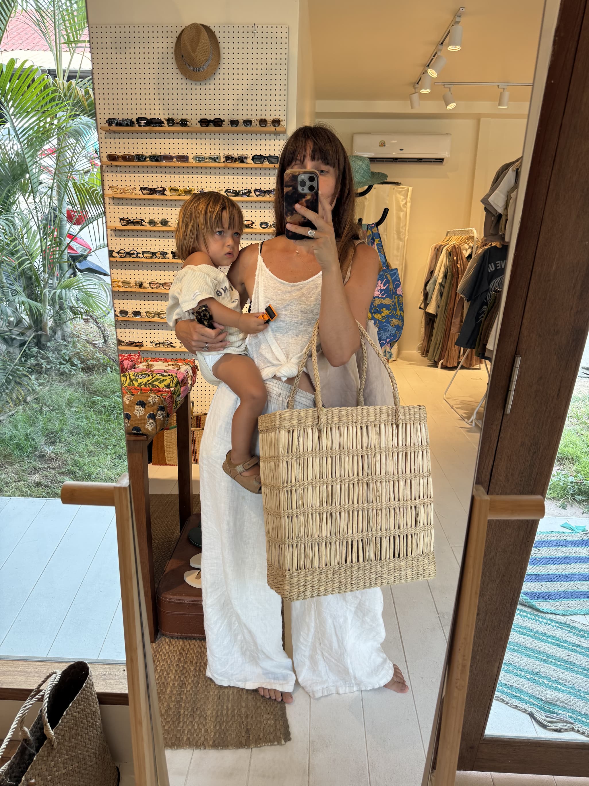 The Paul top in ivory styled with the Jonathan pant in sand