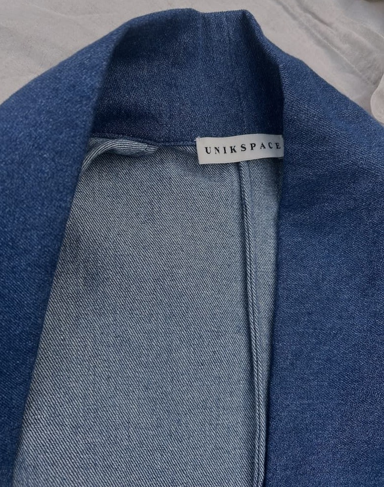 French seam construction detail on a UNIKSPACE garment