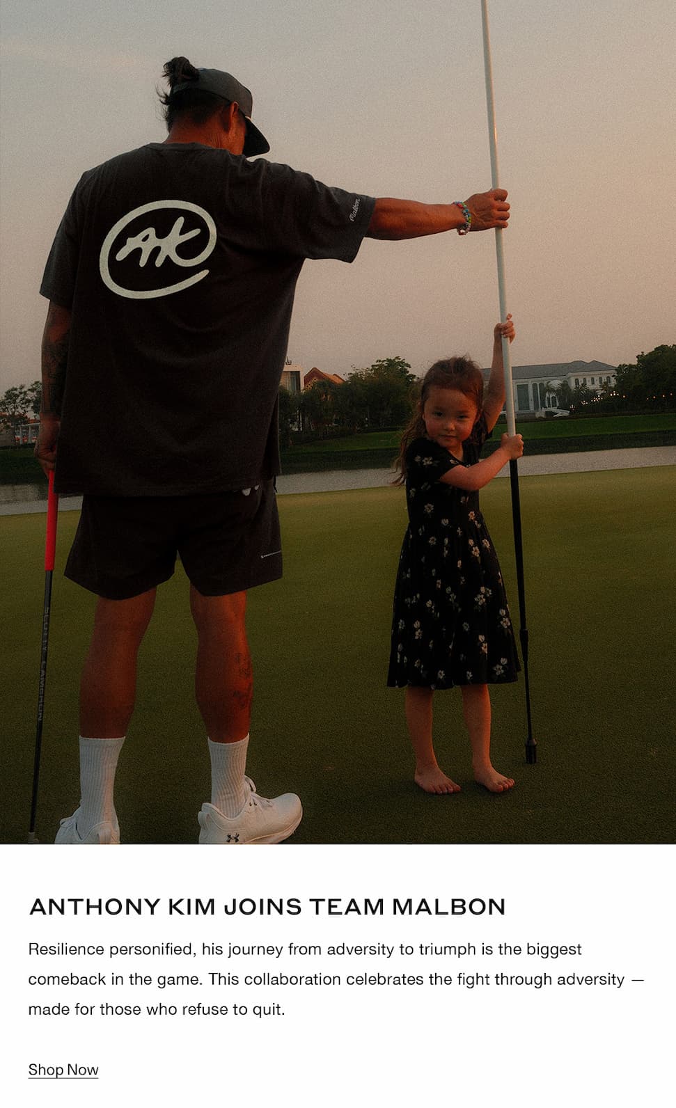 an image of a man and a little girl holding a flag