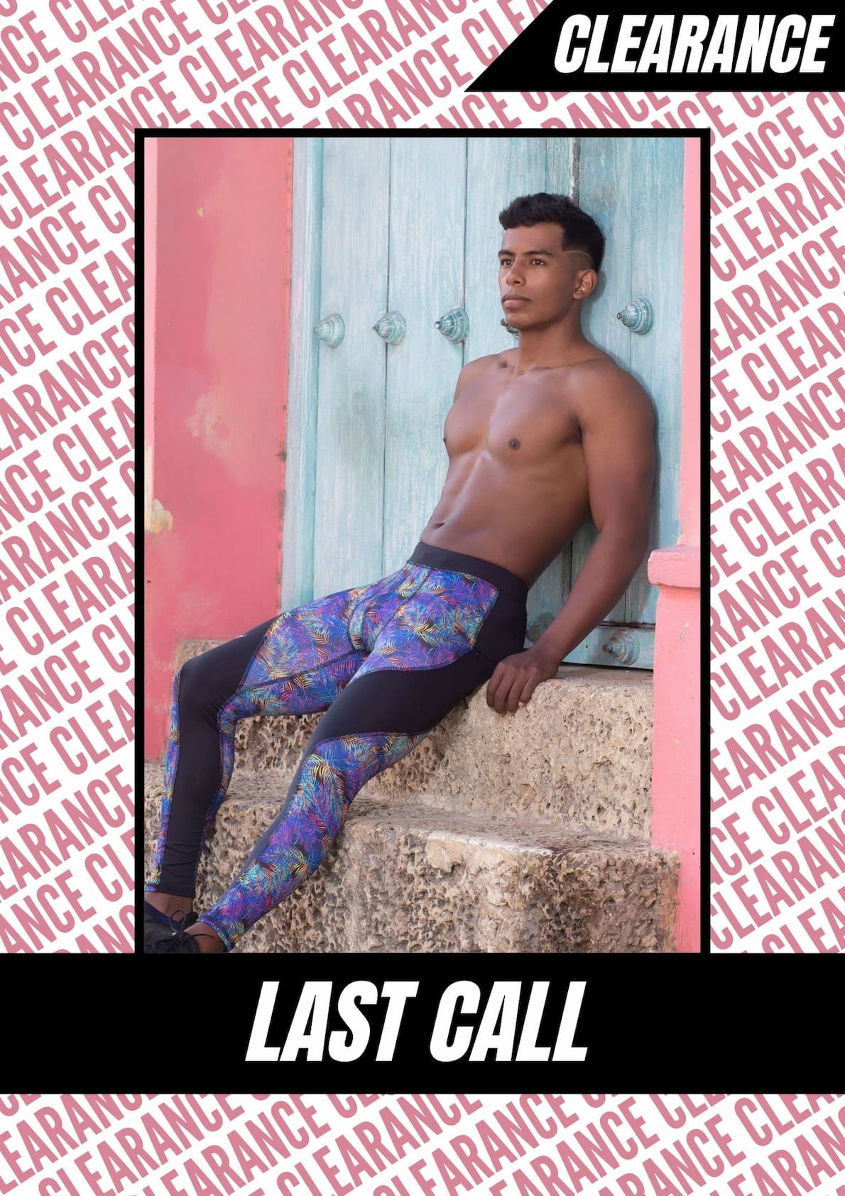 an image of a man in a colorful patterned leggings leaning against a wall