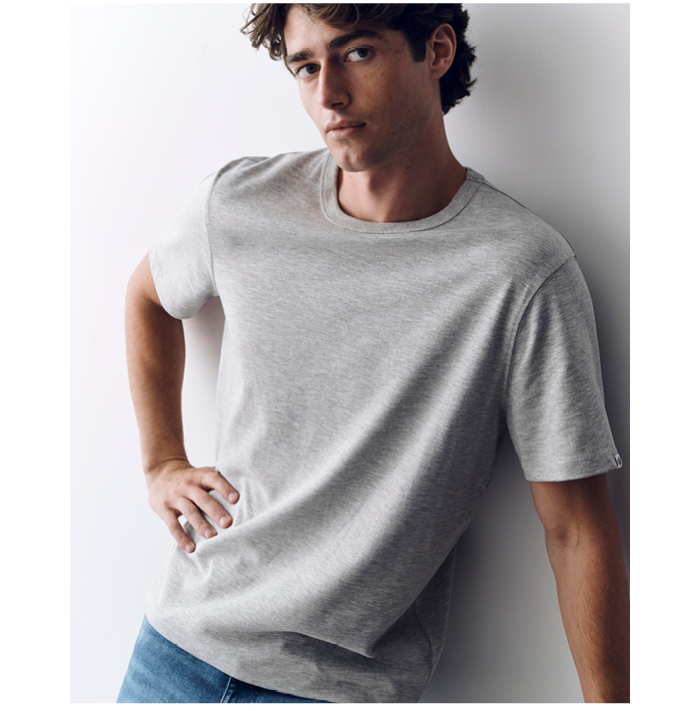 Model in new men tee