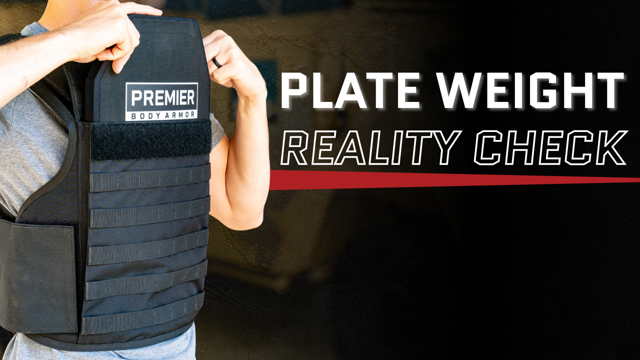 Person inserting a Premier plate into a MOLLE carrier at a vehicle bay