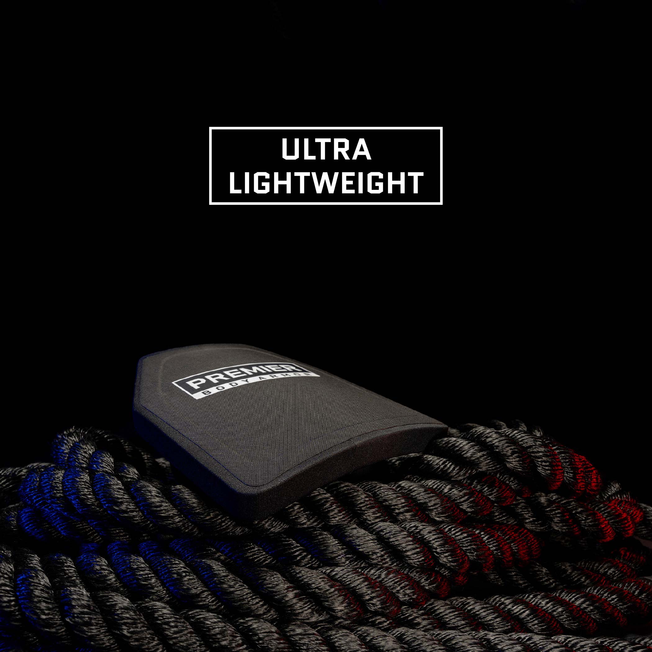 image of a body armor plate laying on a black rope with text callout noting ultra lightweight