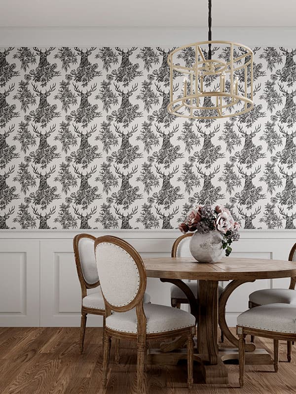 Dining room with deer wallpaper.