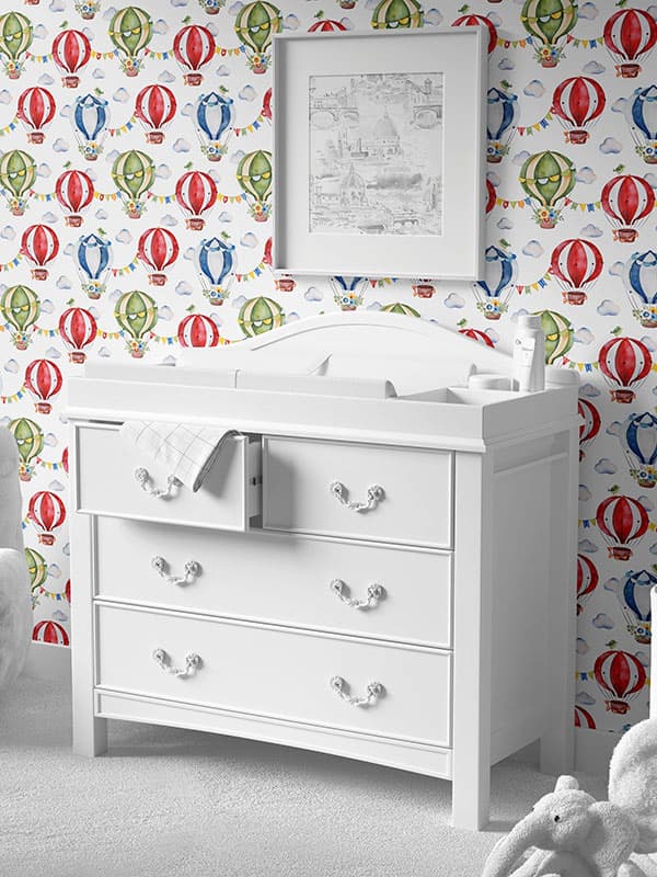 Baby room with hot air balloon wallpaper.