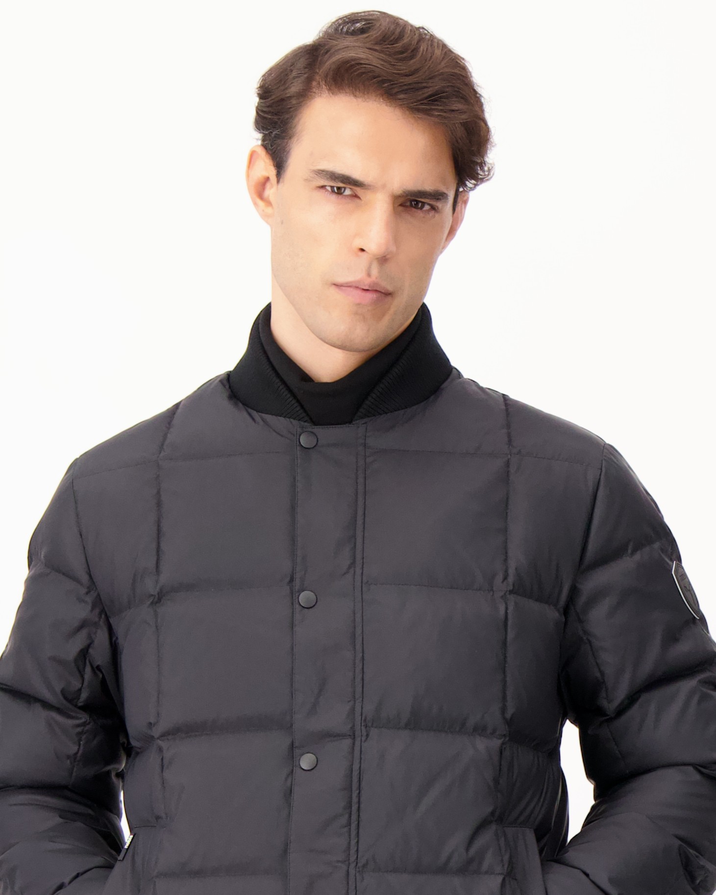 Man wearing Nobis bomber jacket.