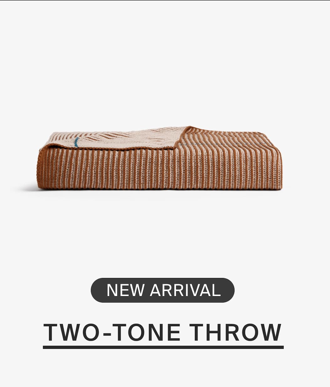 New arrival. Two-tone knit rib throw.