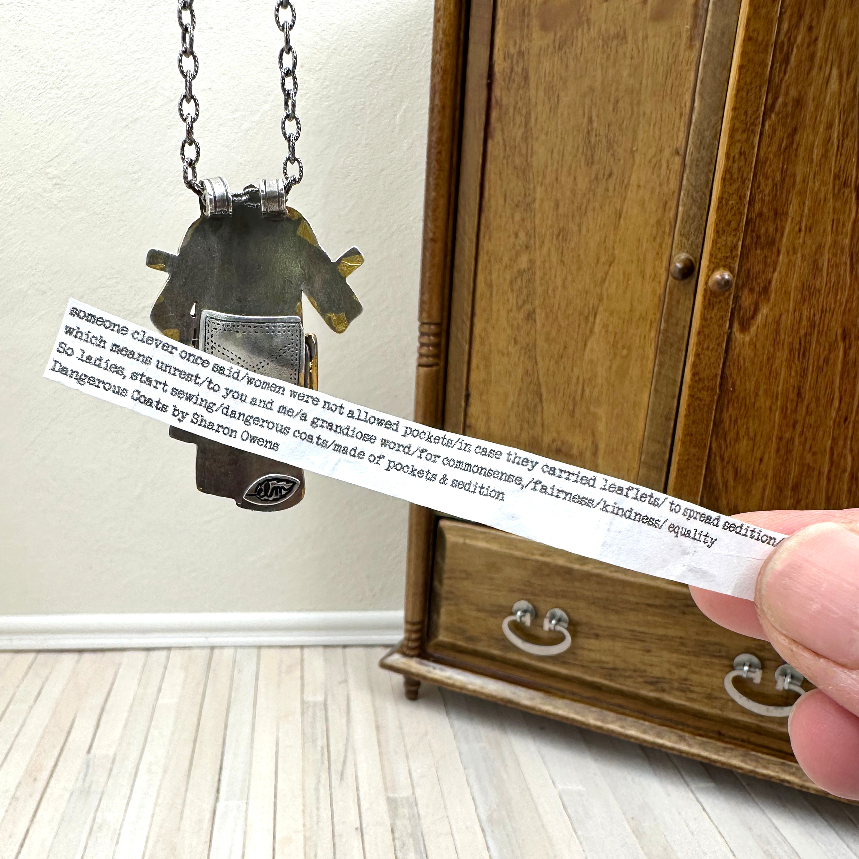 Dangerous coat with pocket detail