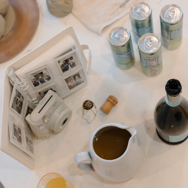 A board of Vermont cheese and local libations on the workshop table