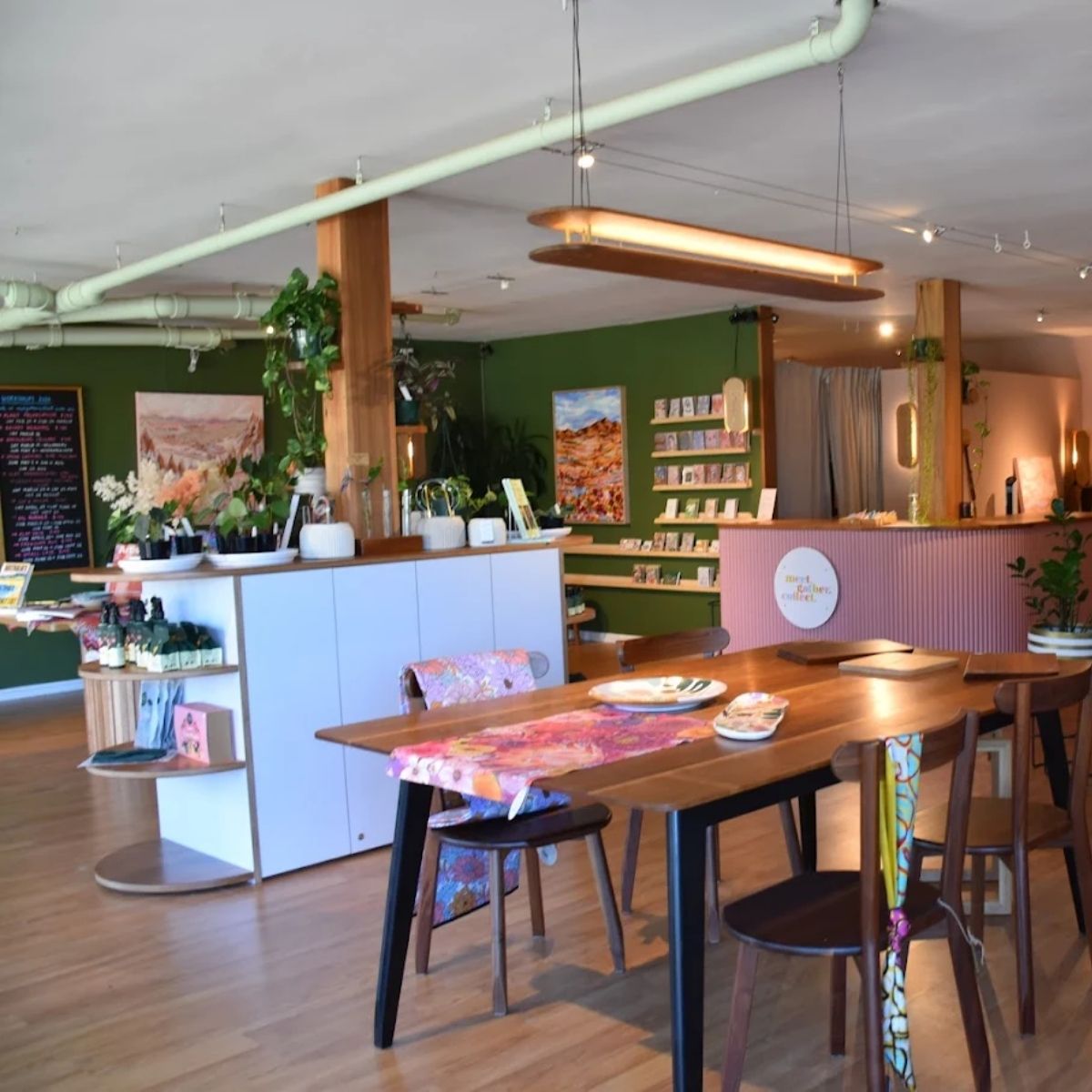 an image of a store with a wooden table and chairs