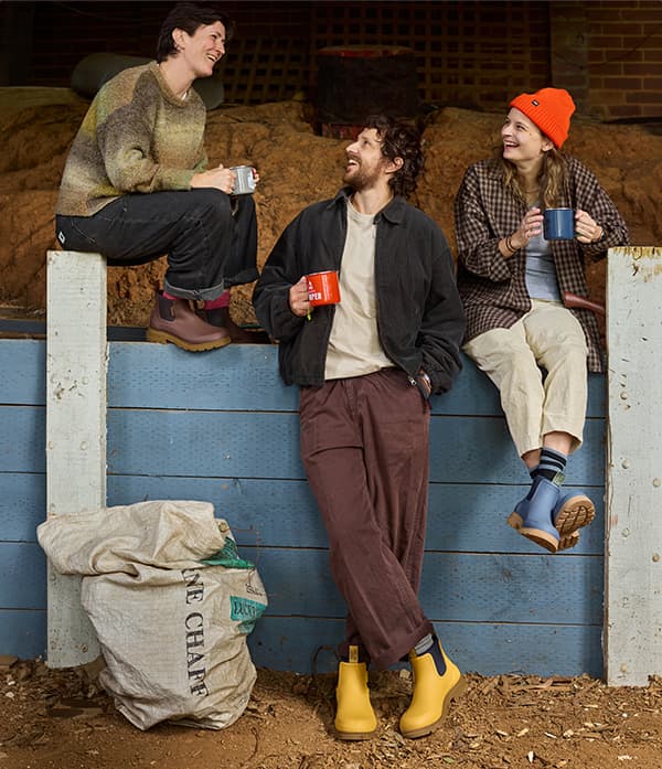 Friends wearing Oberon Boot on a farm